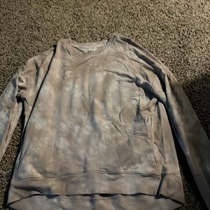 comfortable pink and white tie die sweatshirt and gently used with thumb holes